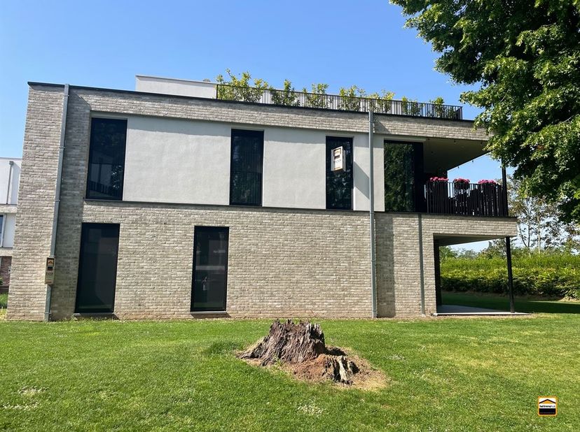 Luxe appartement (136 m² - 1e verdiep) met terras in Domein Bloesempark Borgloon<br />
<br />
In het exclusieve en afgesloten Domein Bloesempark bev