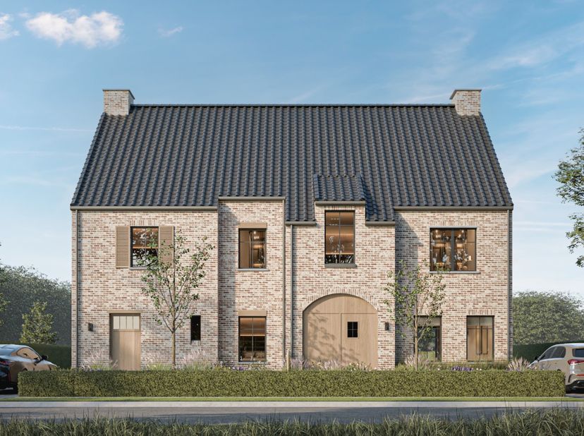 Deze prachtige woning in het groen biedt een bewoonbare oppervlakte van 187,1 m², doordacht ingedeeld met:<br />
<br />
- een ruime, lichtrijke leefru
