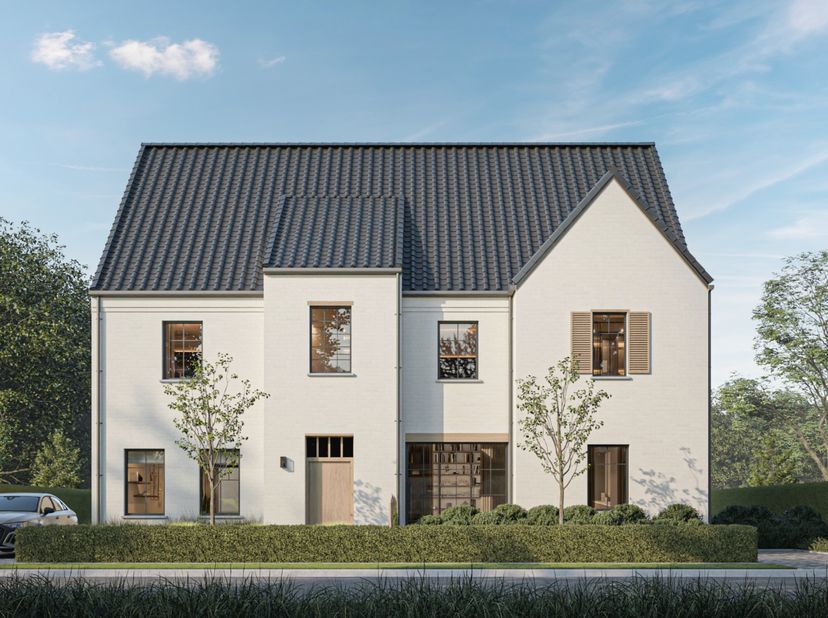 Deze prachtige woning in het groen biedt een bewoonbare oppervlakte van 185 m², doordacht ingedeeld met:<br />
<br />
- een ruime, lichtrijke leefruim