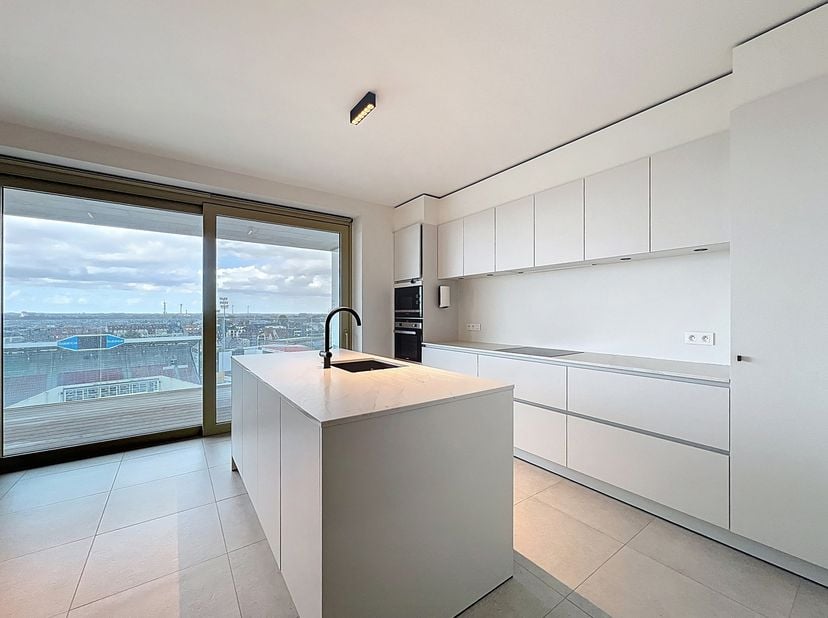 Dit appartement is gelegen in Waterfront Waregem, een prestigieus totaalproject dat wonen, werken, verblijven en recreatie samenbrengt. Het project om