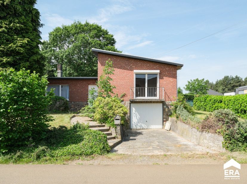 À vendre: maison 4 façades située Zwaluwstraat à Lummen, dans un endroit calme tout en étant proche des accès à lE314/E313. Cette propriété offre un g