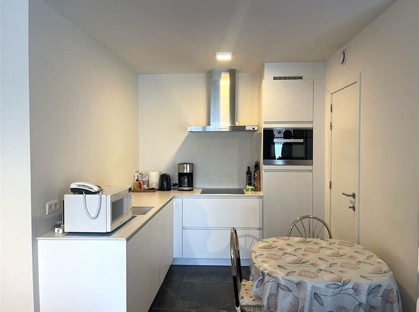 Appartement au rez-de-chaussée avec jardin et parking à Wiekevorst<br />
Situation : Résidence 'DE WIMP', située à l'angle de l'Itegemseweg et de l'He
