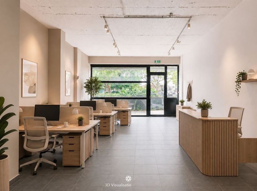 A VENDRE - Vous êtes à la recherche d'un espace commercial avec garage ou d'un investissement idéal à vendre dans le centre de Saint-Nicolas ? Dans ce