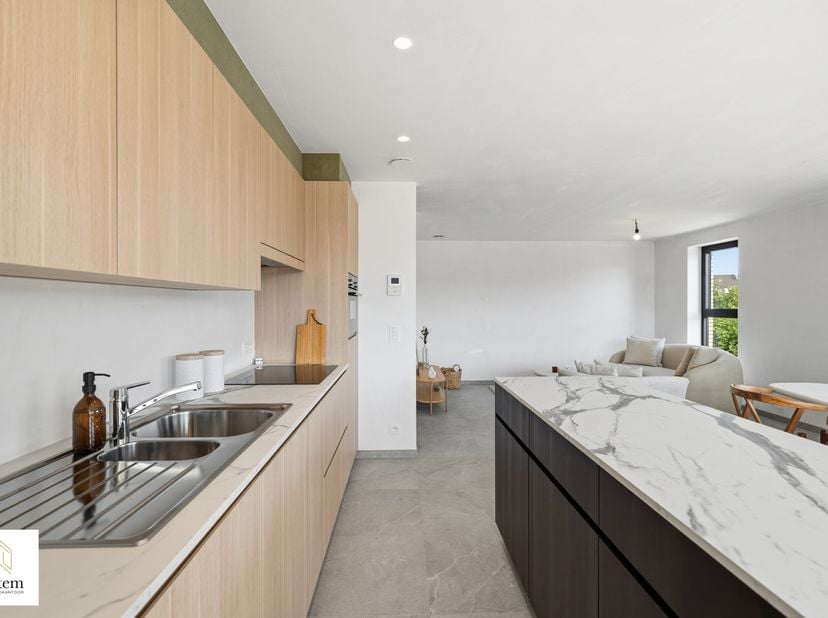 Exclusief en energiezuinig nieuwbouwappartement met ruim terras<br />
<br />
Ontdek dit stijlvolle en hoogwaardig afgewerkte appartement op de eerste