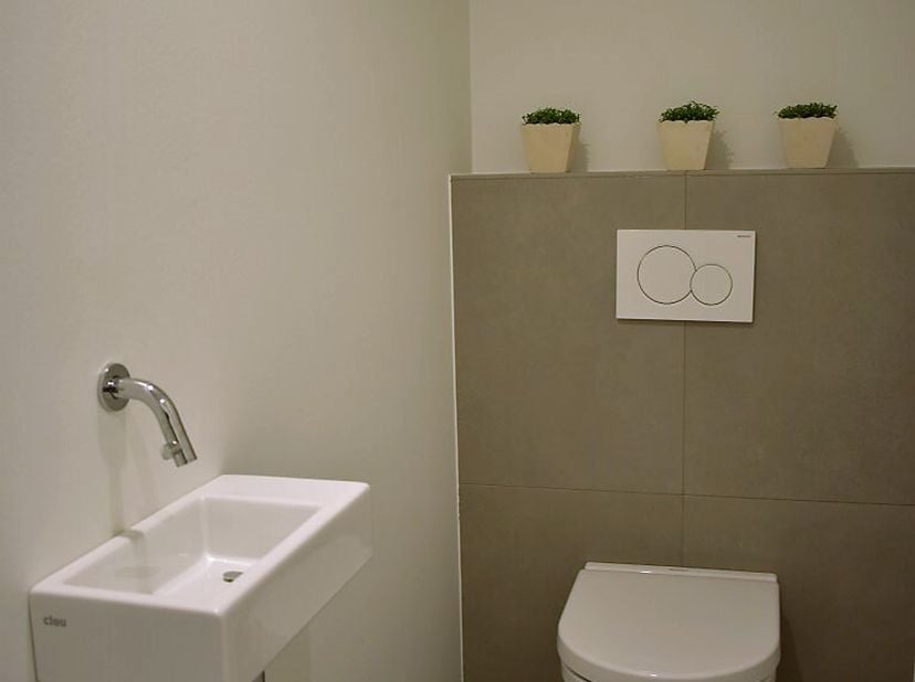 In een rustige straat nabij de markt van Oudenaarde vinden we dit prachtig afgewerkt recent appartement. Het appartement (95m²) maakt deel uit van een