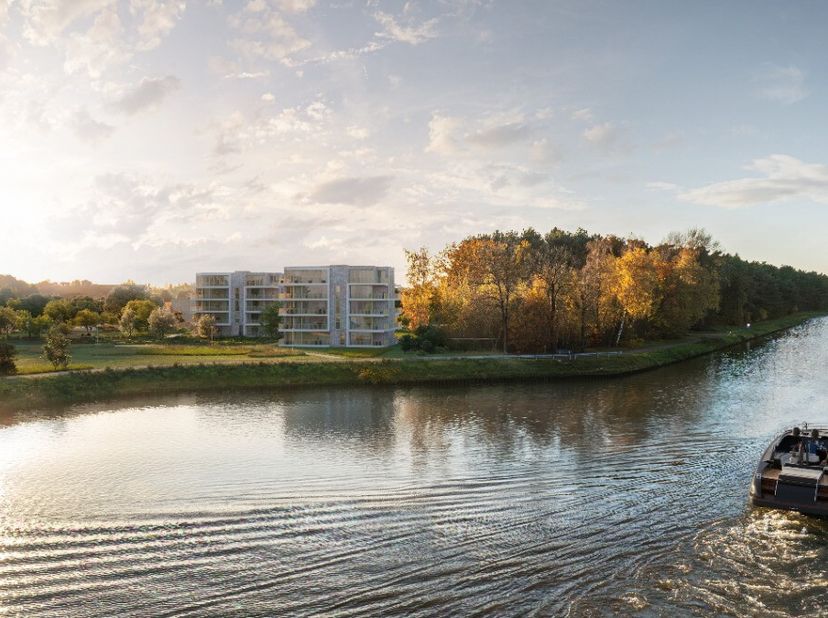 Residentie Blue Barrier: Heerlijk genieten met zicht op natuur en water in Lommel: Prachtig nieuwbouwappartement met één slaapkamer en terras, aan het