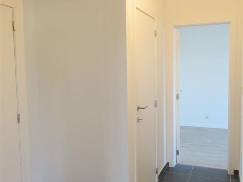 Bel appartement de plain-pied avec terrasse et place de parking souterraine<br />
<br />
Situation : Situé au cœur d'un quartier calme près du centre