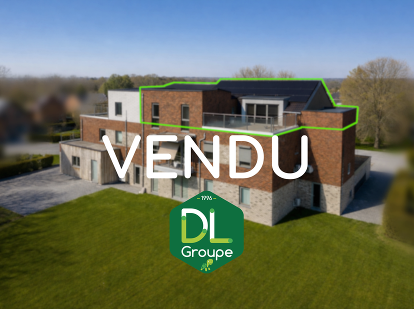 **VENDU** Situé au deuxième étage d'une résidence neuve, cet appartement se compose comme suit : un hall d’entrée desservant un séjour de 60 m² avec u