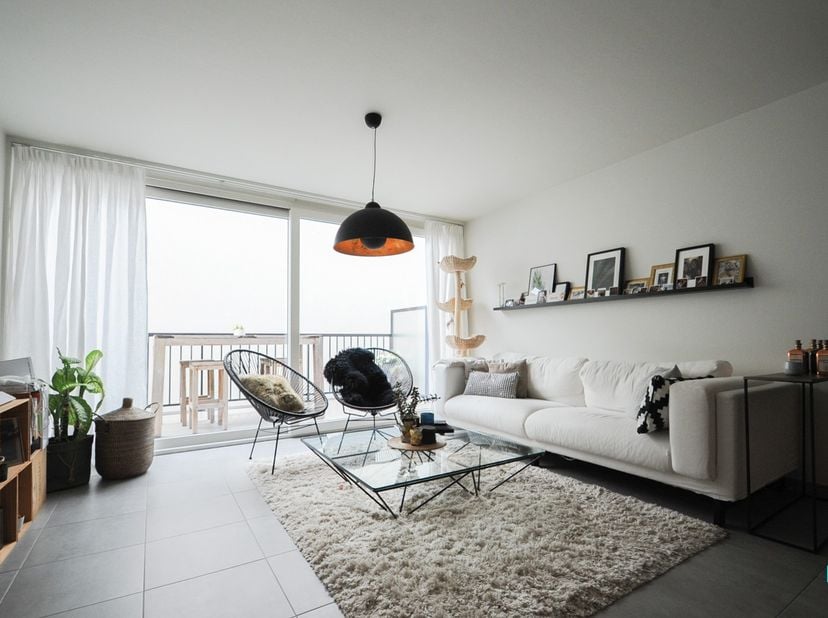 Ruim triplex appartement met een bewoonbare oppervlakte van ca. 135m² (volgens EPB-attest) gelegen in de kleinschalige residentie Boulevard in het cen