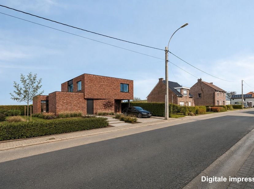 Verscholen in het groene en gegeerde Zepperen, deelgemeente van Sint-Truiden, staat deze imposante villa op een ruim dubbelperceel van 11 are 71 centi