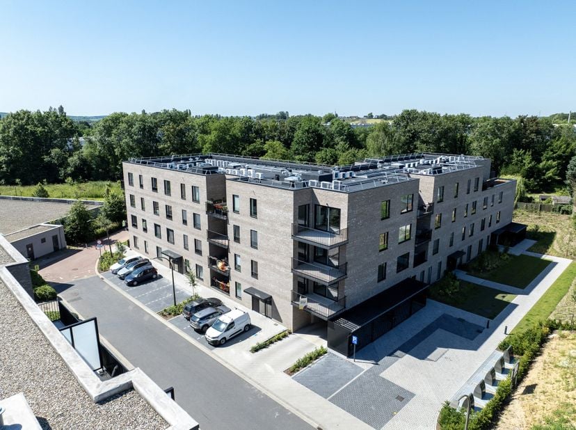 Op zoek naar een appartement te koop in Halle? Dit instapklare nieuwbouwappartement met 1 slaapkamer in Residentie Kwikstaart combineert modern comfor
