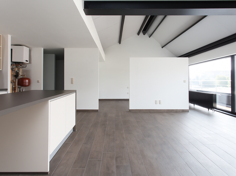 Ontdek deze charmante, lichtrijke loft-appartement van 62 m², ideaal gelegen op de Kortrijksesteenweg nabij het centrum van Sint-Martens-Latem. Deze s