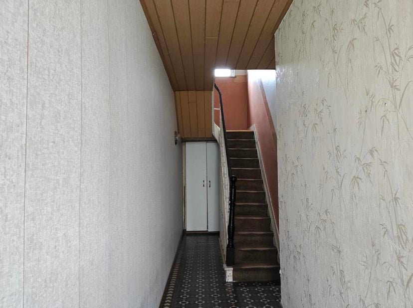 Een rijwoning met karakter en potentieel gelegen in het gezellige centrum van Aarschot! Hier woon je nabij lokale winkels, leuke horeca en toch rustig