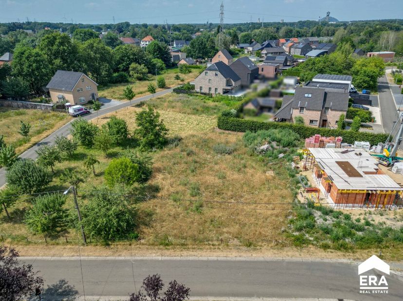 Open bouwgrond in Genk, rustig gelegen in de Oudasserstraat.Deze bouwgrond voor open bebouwing biedt een mooie opportuniteit voor wie een woning op ma