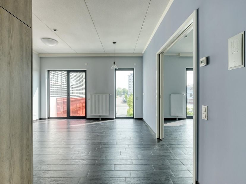 Zorgeloos wonen of beleggen in het centrum van Tienen?<br />
De site "De 2 Poorten" heeft een uitstekende ligging in een residentiële wijk in het stad
