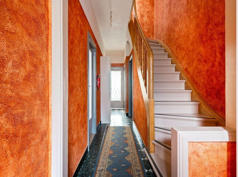Woning (168 m²) met vier slaapkamers en ruime tuin<br />
Ligging:<br />
Deze woning is gelegen in de Krugerstraat in Hoboken, op een centrale en vlot