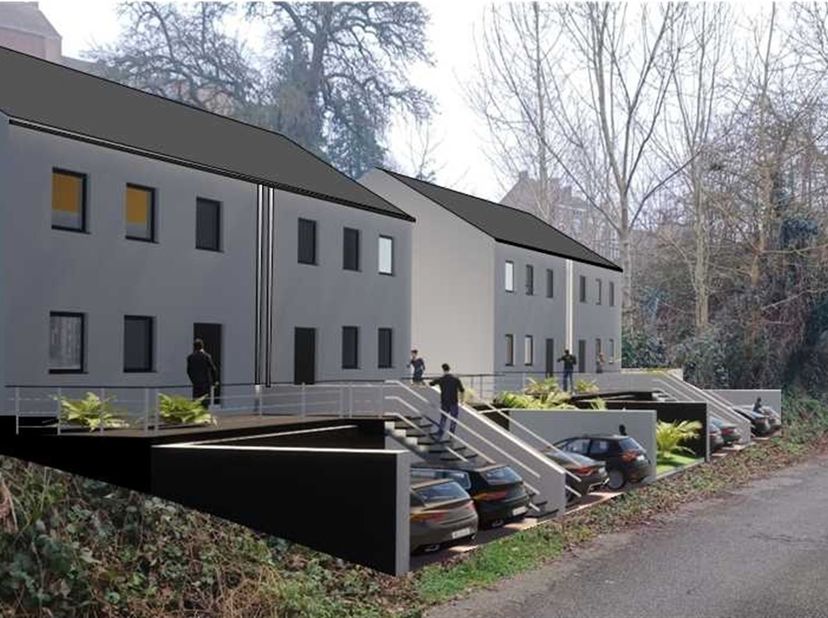 Terrain à bâtir de 23 ares 11ca, avec permis accordé pour la construction de 4 habitations 3 façades, sis dans une rue paisible de Colfontaine. <br />