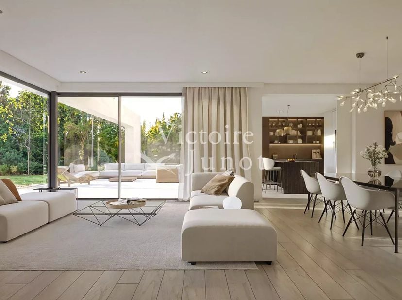 Victoire Junot stelt u dit uitzonderlijke gelijkvloerse appartement van 228 m² voor, gelegen in het prachtige project F59, vlak bij het Zoniënwoud en