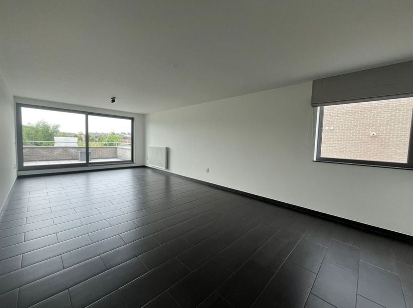 Appartement agréable avec 2 chambres, une grande terrasse et un garage<br />
Situation : Un emplacement calme et central où vous profiterez de la prox