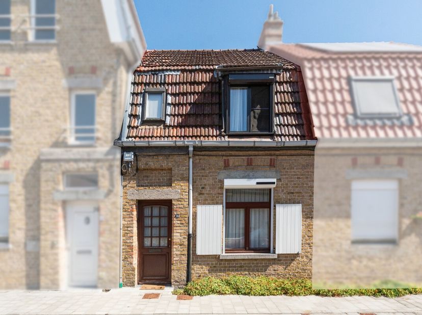 Knusse woning met tuin, garage en tal van mogelijkheden aan de buitenrand van Eeklo Op zoek naar een gezellige woning met potentieel, gelegen op een r