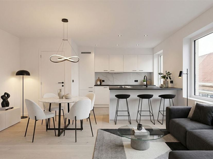 Appartement entièrement rénové avec terrasse à Wevelgem<br />
.<br />
Au deuxième étage d'un immeuble bien entretenu, près du centre de Wevelgem, vous