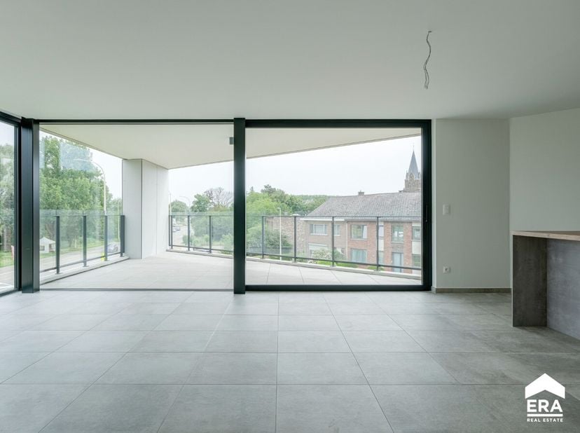 tapklaar luxeappartement met 3 slaapkamers, zonnig terras van 24m² inclusief een staanplaats en kelderberging in het centrum van Halen, op korte afsta