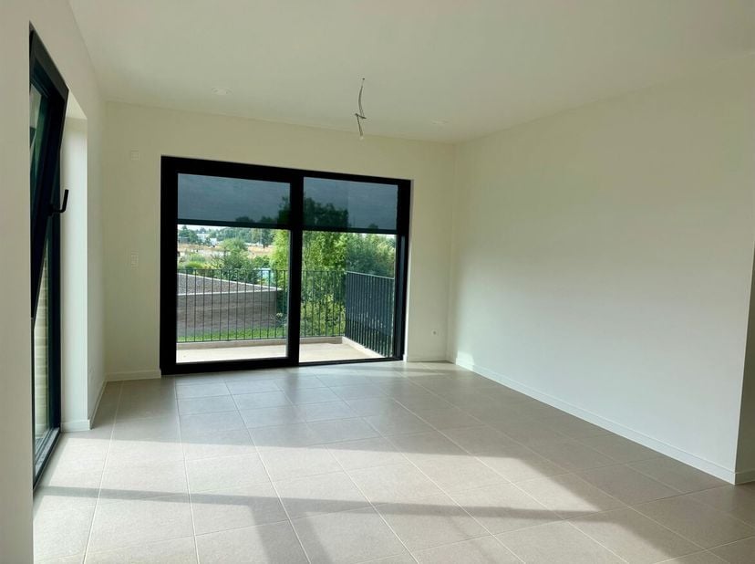 Magnifique appartement neuf de 2 chambres, avec place de parking et terrasse exposée sud à Lier !<br />
Situation<br />
Cet appartement BEN à faible c