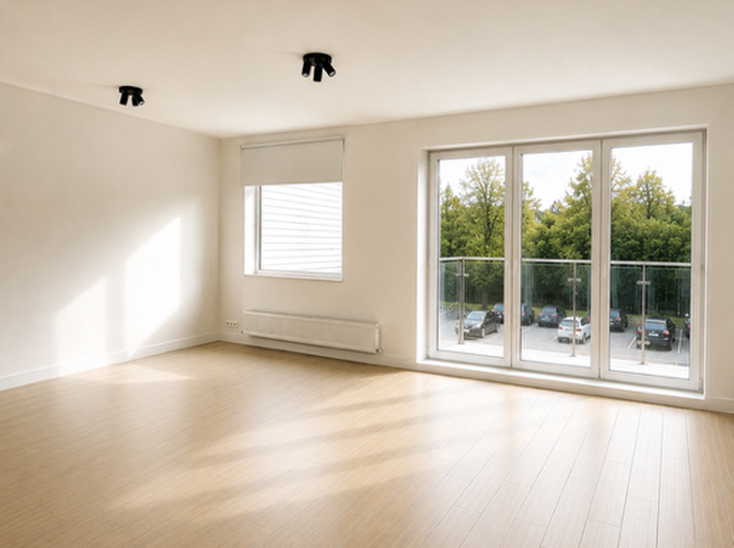 Dit verzorgde en energiezuinige appartement met garagebox bevindt zich op de tweede verdieping en beschikt over:<br />
<br />
•	Ruime leefruimte met a