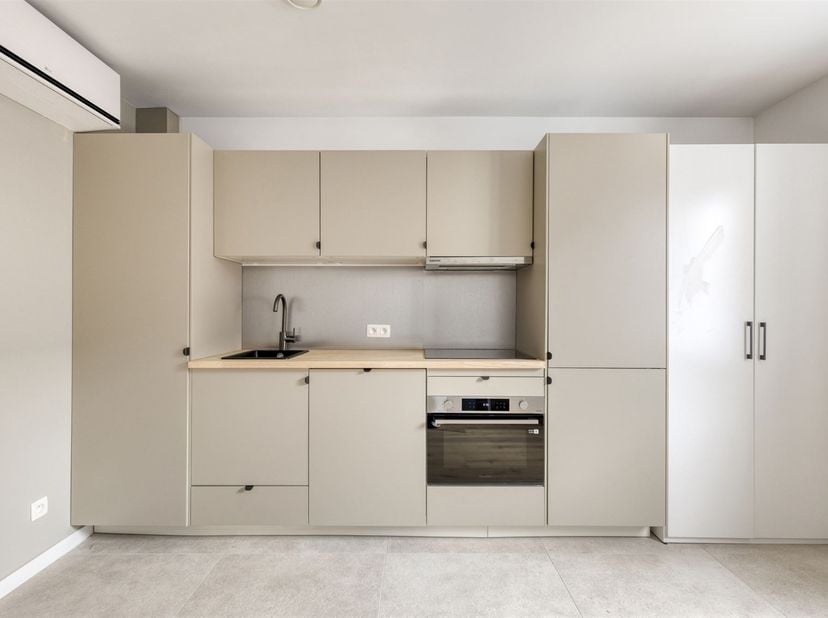 **Alle informatie op www.connect-immo.be**<br />
<br />
Op een steenworp van het centrum van Leuven kan je dit opbrengstpand met 5 vernieuwde studio's