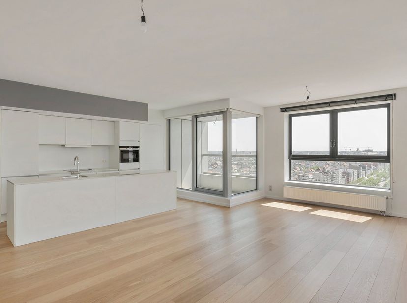 Exclusief wonen met adembenemend panoramisch uitzicht in hartje Antwerpen<br />
Op de 16de verdieping van een stijlvolle residentie "Londen Tower" bev