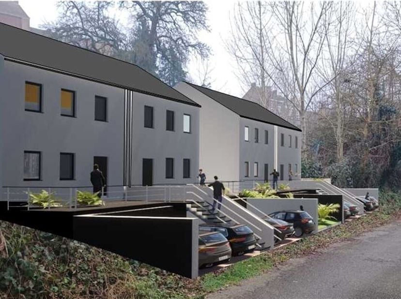 Terrain à bâtir de 23 ares 11ca, avec permis accordé pour la construction de 4 habitations 3 façades, sis dans une rue paisible de Colfontaine. <br />
