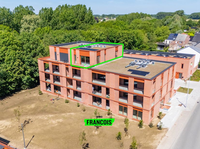 In het stijlvolle nieuwbouwproject Eilandpark te Sint-Lievens-Houtem, op wandelafstand van het centrum, bevindt zich deze exclusieve en hoogwaardig af