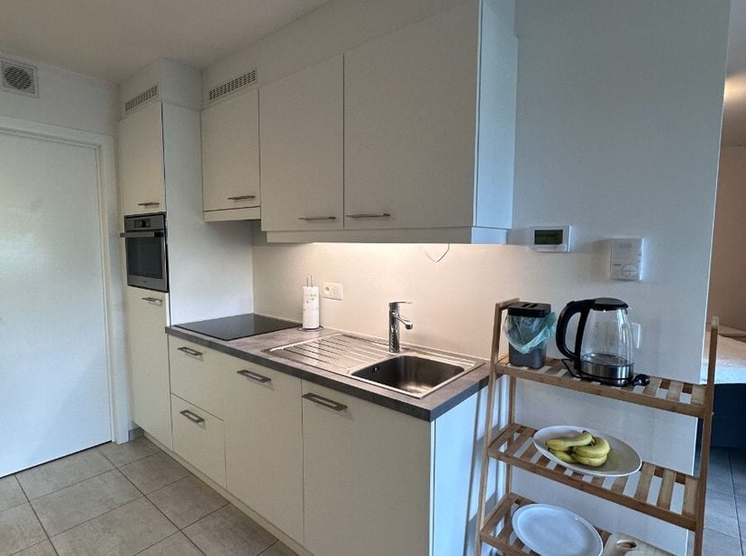 Gelijkvloers appartement met 1 slaapkamer te huur in Geel:Geniet van een gezellig terras en extra comfort dankzij de private kelderberging en een eige