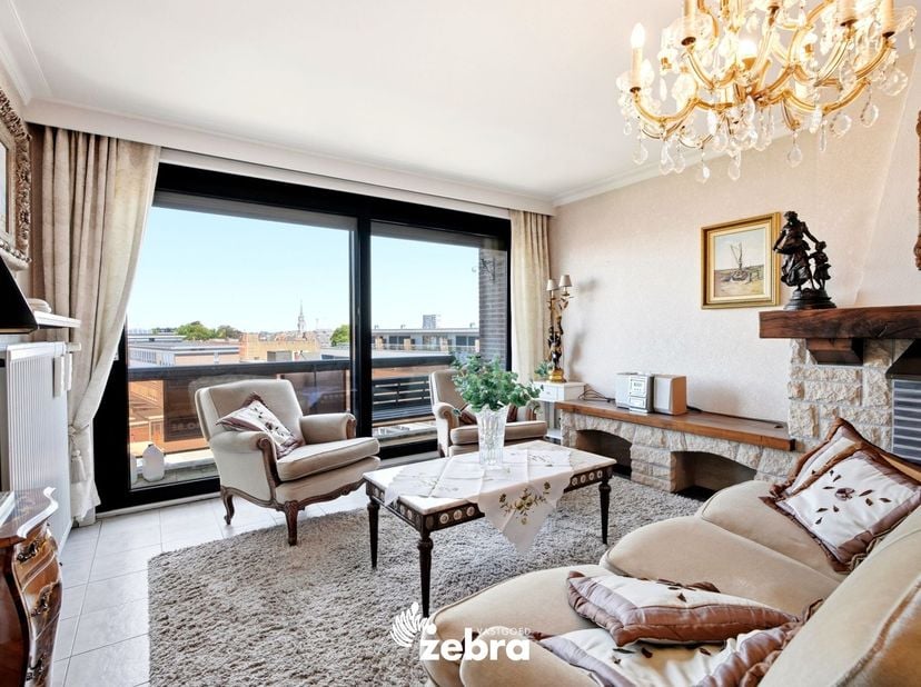 Instapklaar/licht op te frissen appartement met twee slaapkamers, 2 terrassen in Residentie Mayfair, pal aan het Polenplein in Roeselare. De Grote Mar