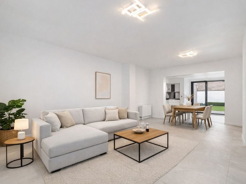 In het hart van Eeklo bevindt zich deze prachtige, volledig gerenoveerde woning die modern wooncomfort perfect combineert met een centrale ligging. Ac
