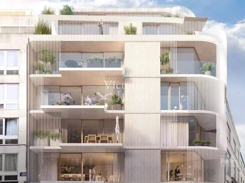 Victoire-JUNOT nodigt u uit om dit zeer ruime NIEUWE appartement met 3 slaapkamers in het project "THE BRIGHT" te ontdekken:<br />
De inkomhal, met ga