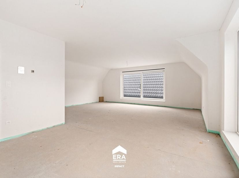 Dit nieuwbouw penthouse-appartement is centraal gelegen in het hart van Opitter, Bree, op wandelafstand van de school, het openbaar vervoer en het par