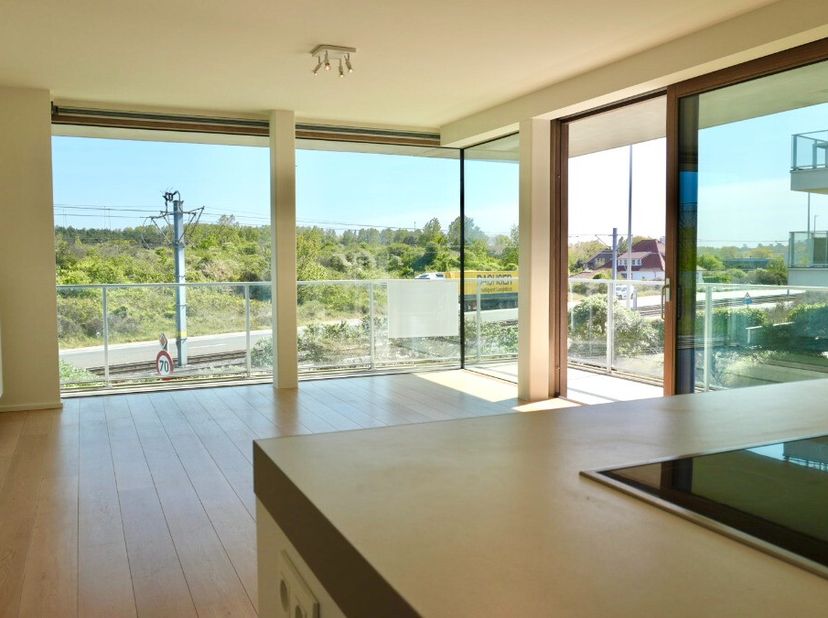 Te koop: modern appartement met open zicht in Sint-André (Oostduinkerke)  Rietveld Projects In het charmante Sint-André te Oostduinkerke bevindt zich