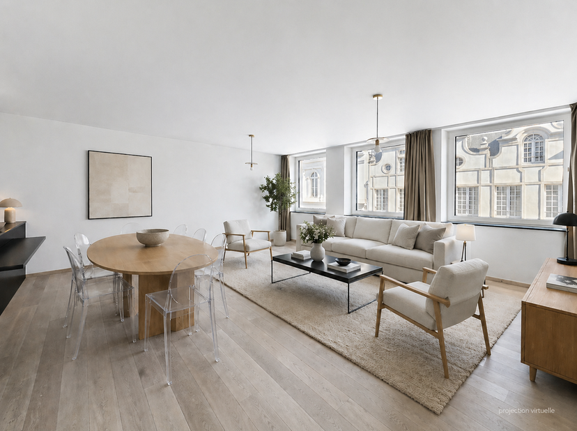 À proximité immédiate du Mont des Arts et de la Gare Centrale, cet appartement entièrement rénové en 2018 bénéficie d’un emplacement particulièrement