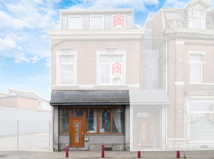 Idéalement situé à proximité de toutes les commodités, découvrez cet appartement au rez-de-chaussée offrant 2 chambres et une cour privative de 28 m².
