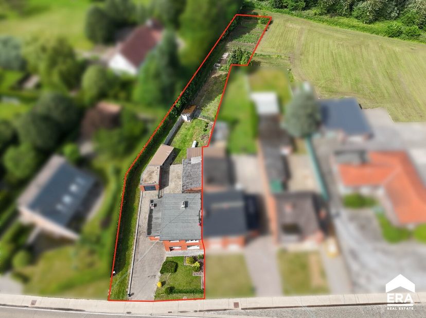 Te koop: te renoveren halfopen bebouwing in landelijke omgeving, gelegen aan de Kolmenstraat 73 in Stevoort, Hasselt. Deze woning biedt 153 m² woonopp