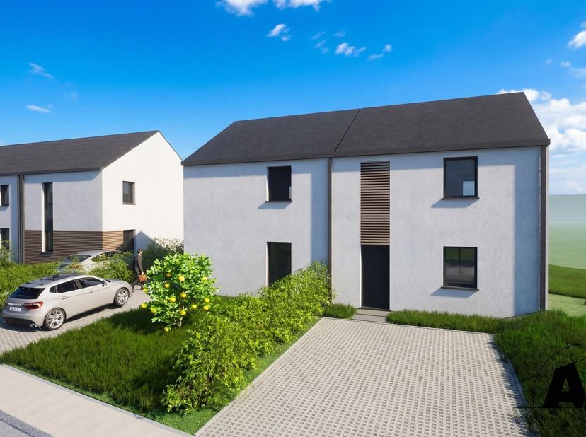 W Immobilière stelt u in Tintigny deze hedendaagse nieuwbouwwoning voor, gelegen op een perceel van meer dan 614 m². Deze halfopen woning met tuin bie