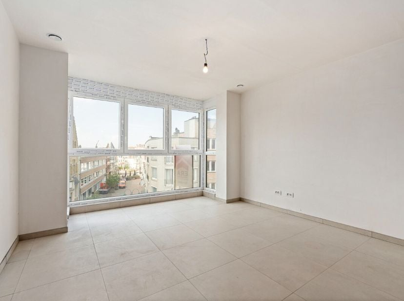 Nieuwbouw 1-slaapkamerappartement te huur  Residentie TRAPEGEER Dit modern nieuwbouwappartement is gelegen op de derde verdieping in Residentie TRAPEG