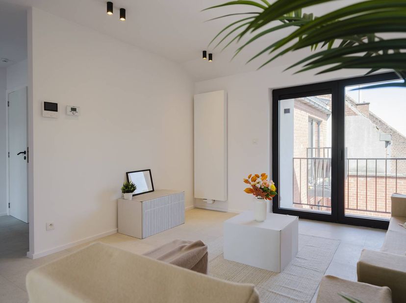 Cet appartement entièrement rénové est situé à proximité du centre de Wevelgem.<br />
La résidence ne contient que 5 entités, les coûts d'entretien so