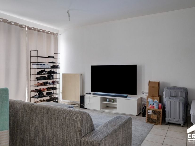 À vendre : appartement prêt à emménager à Hasselt, mitoyen dun côté, idéalement situé à proximité des transports en commun, de la gare et des axes rou