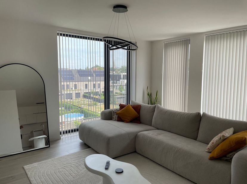Zeer energiezuinig appartement met 2 slaapkamers, terras en autostaanplaats op toplocatie in Heist-op-den-Berg<br />
<br />
Ligging:<br />
Rustig g
