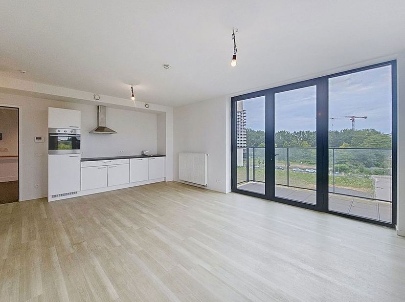 ANDERLECHT- Le long du Canal  dans une nouvelle  résidence. Bel appartement de +/-56 m² brut - situé au 3ᵉ étage, il se compose d'un séjour ouvert sur