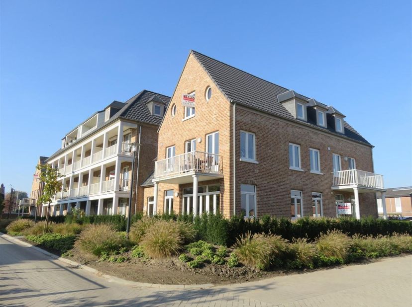 Bel appartement de plain-pied avec terrasse et place de parking souterraine<br />
<br />
Situation : Situé au cœur d'un quartier calme près du centre