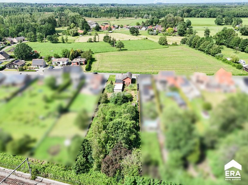 6% btw sloop &amp; heropbouw! Mooie bouwgrond voor open bebouwing op perceel van 30are 52ca met een straatbreedte van 24m in een groene en landelijke omge