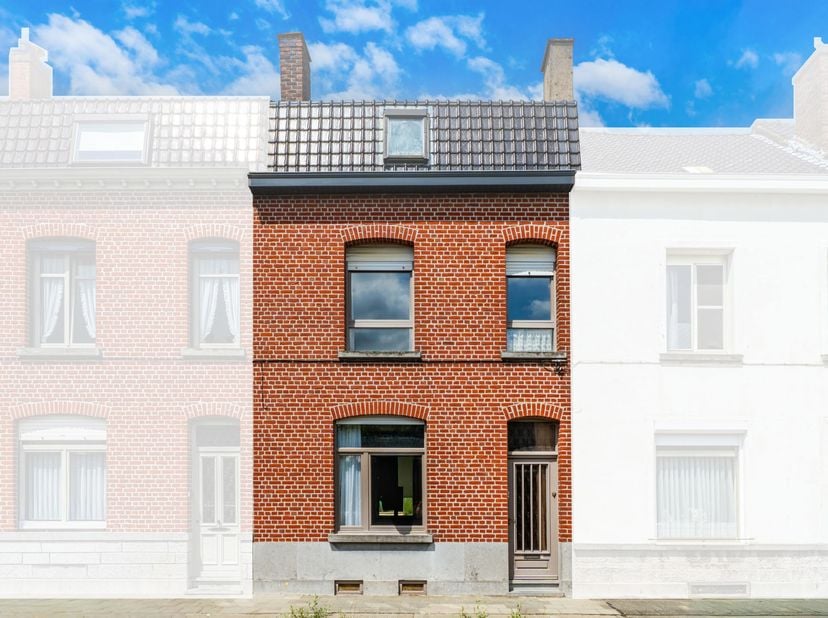 Herenhuis met grote tuin en mogelijkheid tot 3 slaapkamers<br />
Dit herenhuis ligt dicht bij het centrum van Doornik en alle voorzieningen en ontwikk